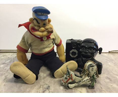 A lot to include a rubber Popeye toy, Muffin the Mule toys, box camera and novelty money box.