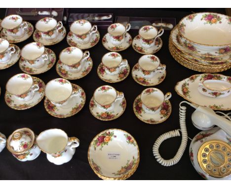 A Royal Albert Old Country Rose tea service with The Royal Albert Telephone etc.