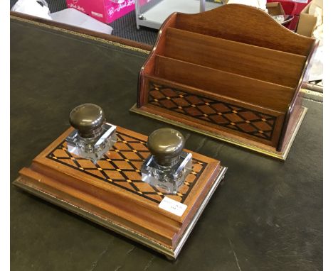 *A 19th Century inkwell stand with two glass inkwells having inlaid geometric design with similar letter rack.