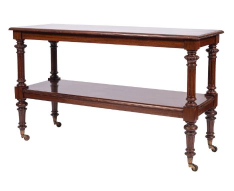 A Victorian mahogany two-tier buffet, by Marsh and Jones of Leeds, circa 1880; the top and shelf with moulded edges, with mak