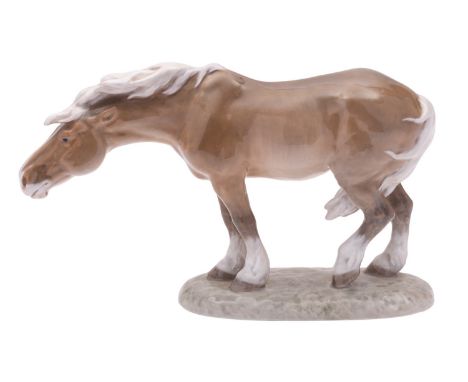 A Royal Copenhagen figure 'Windswept Horse' modelled by Lauritz Jensen, on mound base, underglaze blue and green printed mark