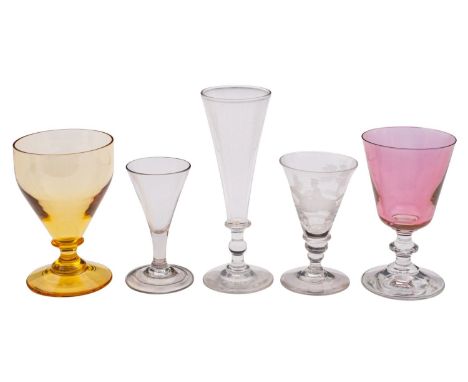 A mixed group of drinking glasses, comprising an ale mug engraved with hops and barley, a small trumpet shaped wine glass eng