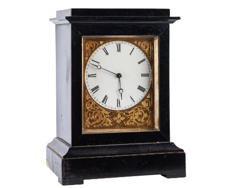 A Victorian French small ebonised mantel clock having an eight-day duration timepiece movement, the white enamel dial having 