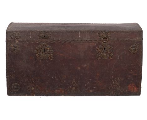 A substantial Continental metal mounted leather covered pine trunk, probably Low Countries, 18th century; with hinged and dom