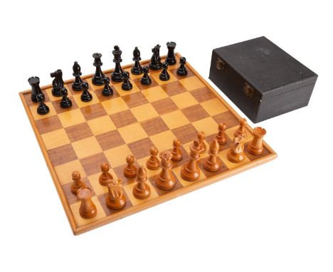 A boxwood and ebonised Staunton pattern chess set, mid 20th century; the kings 8.5cm high, the pawns 4cm high; and a sycamore
