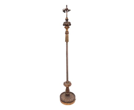 A Venetian carved and giltwood standard lamp in 17th century style, early 20th century; with three electrical fitments on a r