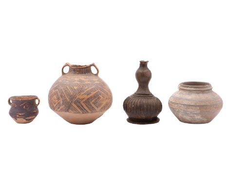 A mixed lot of Chinese pottery, Neolithic and later including two two-handled vessels with geometric decoration in black, 12 