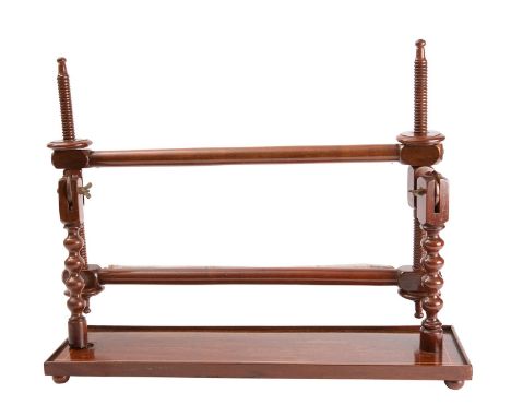 A Victorian mahogany tapestry frame, late 19th century; the turned adjustable frame on bobbin turned supports, with sycamore 
