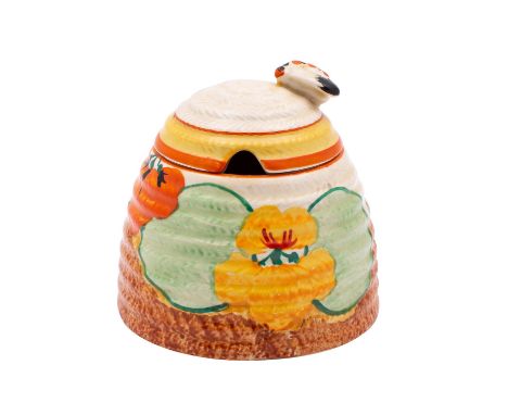 A Clarice Cliff beehive honey/preserve pot decorated in the Nasturtium pattern, printed marks, circa 1930, 9cm.