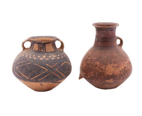 Two Chinese Neolithic terracotta vessels painted in black with geometric designs, 18 and 22cm [damages].