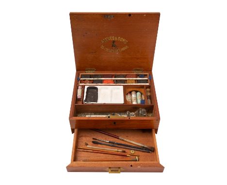 A Victorian mahogany artist's paint box by Reeves & Sons, late 19th century; the hinged cover with maker's name in gilt lette