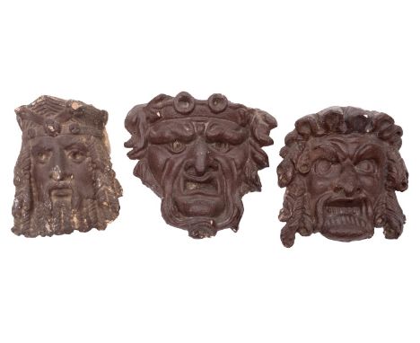 Three painted plaster masks in the manner of Thomas Hope, 19th century; probably previously elements from an architectural sc