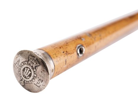 A white metal topped malacca walking stick, 19th century; the pommel engraved AE, apparently for Albert Edward, either side o