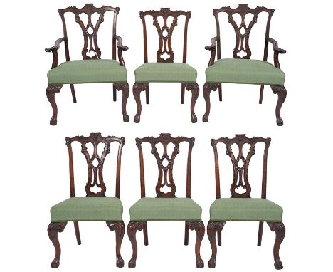 A set of six carved mahogany and upholstered dining chairs in Chippendale style, late 19th century and later reupholstered; t