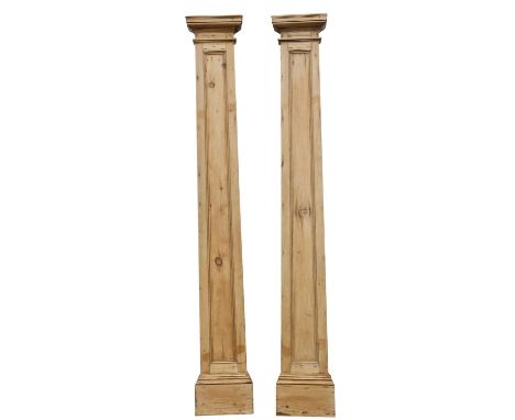 A pair of 19th-century pine architectural pilasters; with moulded tops, panels and plinth bases; 230cm high, 33cm wide, 12cm 