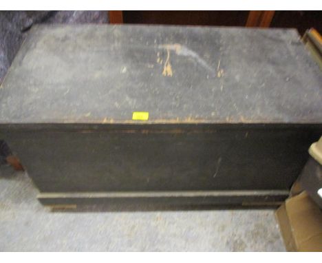 A large vintage trunk with interior trays containing wooden handled and other tools 