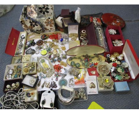 A large quantity of 20th century costume jewellery to include pearls, seed pearl necklaces, retro enamelled earrings, mixed s