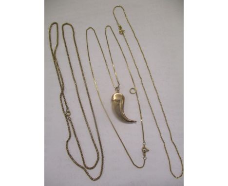 Two 9ct gold chains, a 9ct gold part covered claw and a gold coloured chain 