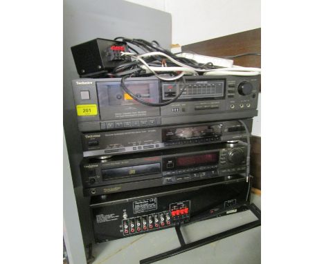 A Technics Hi-Fi unit comprising stereo cassette deck, stereo integrated amplifier, compact disc player and stereo tuner 