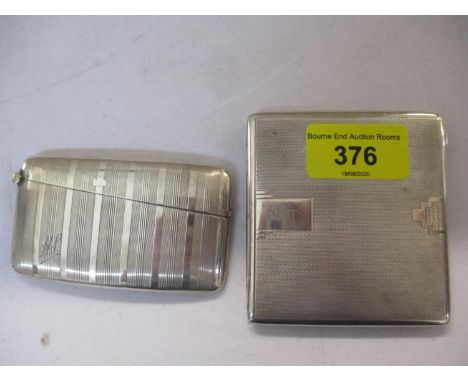 A silver engine turned card case and a silver cigarette case 