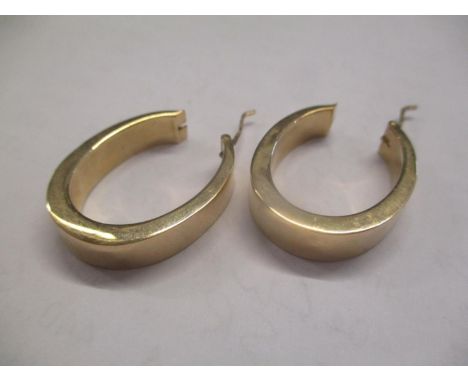 A pair of 9ct gold earrings 