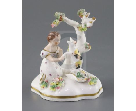 A rare Staffordshire porcelain group of a cat and a girl by a tree, possibly Dudson, c.1835-50, the cat seated on a hat and l