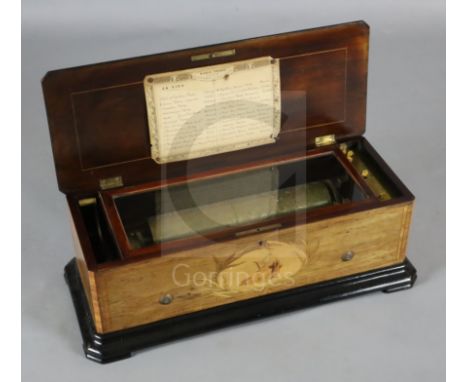 A late 19th century Nicole Freres of Geneva 24 air musical box, the faded rosewood case marquetry inlaid with a cherub riding