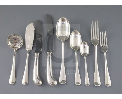 A late Victorian canteen of silver Hanovarian rat tail pattern flatware by Goldsmiths &amp; Silversmiths Co, comprising seven