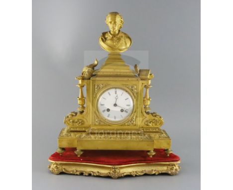 A 19th century French ormolu mantel clock, surmounted with a bust of Shakespeare, surmounted with attendant motifs over an en