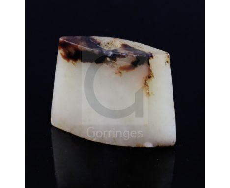 A Chinese pale celadon and brown jade pendant, possibly archaic, W. 4.5cmCONDITION: A few tiny splinter chips to the edges, n