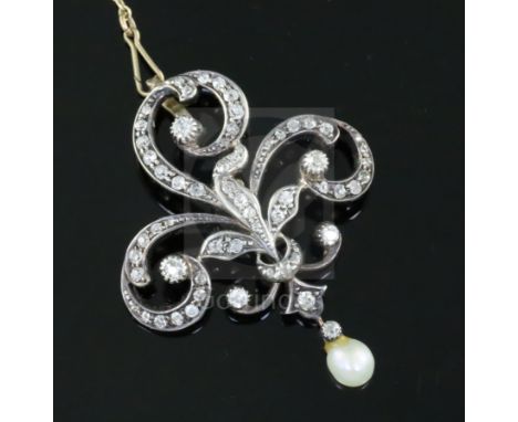 A late Victorian gold and silver, diamond and drop pearl set openwork scroll pendant brooch, 43mm, gross weight 8.9 grams.CON