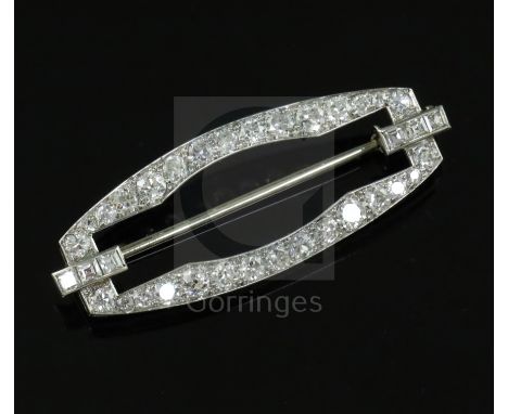 An 1930's Art Deco French Boucheron platinum and diamond set openwork brooch, of shaped rectangular form, set with round and 