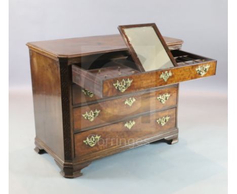 A George III mahogany Chippendale period dressing chest with fitted top drawer and three further graduated long drawers, on b