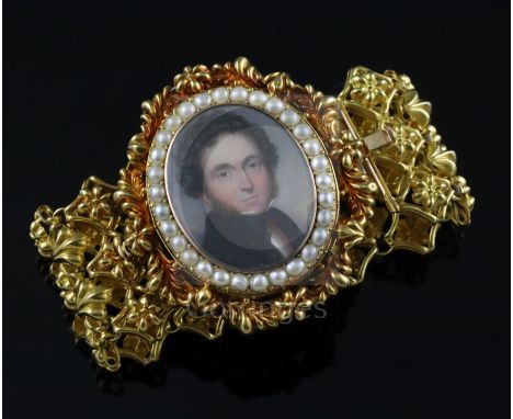 A Victorian gold (tested as 18ct) pierced link mourning bracelet, with detachable inset oval oil on ivory portrait miniature 