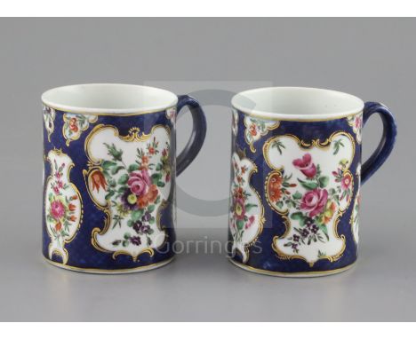 A good pair of small Worcester mugs, circa 1768, of cylindrical form, painted with garlands of flowers in gilt-bordered rococ