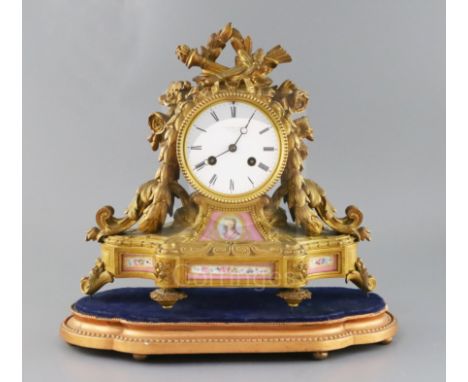 A.B. Savory &amp; Sons of Cornhill. A late Victorian ormolu mantel clock, with trophy, flower and bell husk decorated case, e