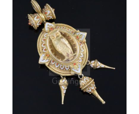 A Victorian etruscan style gold and two colour enamel oval drop pendant, the pendant with central figure of an owl, the surro