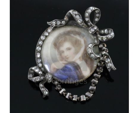 A 19th century gold and silver, rose cut diamond and mother of pearl mounted miniature portrait brooch, with ribbon bow surmo