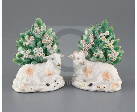 A pair of Derby figures of recumbent sheep, c.1765, each in front of bocage, patch marks, H. 10.3cmCONDITION: Provenance - Th