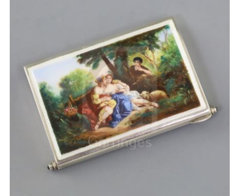 A 1920's/1930's continental silver and enamel rectangular minaudiere, the lid decorated with figures in woodland scene, the c