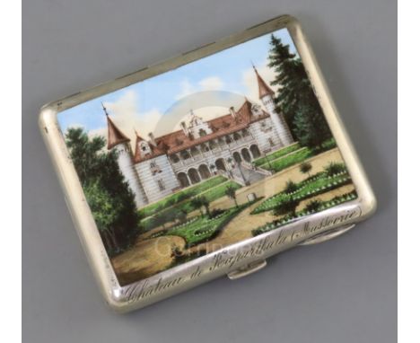 A late 19th/early 20th century German 800 standard silver and enamel cigarette case, the lid decorated with the Chateau de Ka