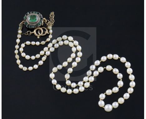 A single strand graduated cultured pearl necklace with emerald cluster set clasp, 50cm.CONDITION: Two small stone missing and