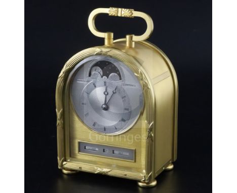 Philip Thornton for Frodsham. A gilt brass cased humpback eight day carriage timepiece, the silvered engine turned dial with 