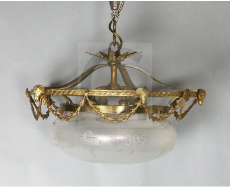 An Adam revival gilt brass and etched and cut glass hall lantern with pineapple finial, swagged ram's head border and ribbon 