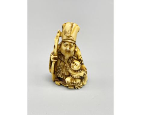 Meiji period Netsuke of a man and a child
