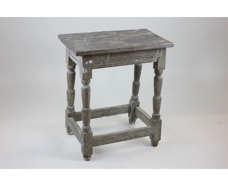 A 17th century oak joint stool, 55cm high (NC)