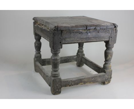 A 17th century oak stool, square top (now in two parts) on turned supports and stretchers (a/f), 38cm, (NC)