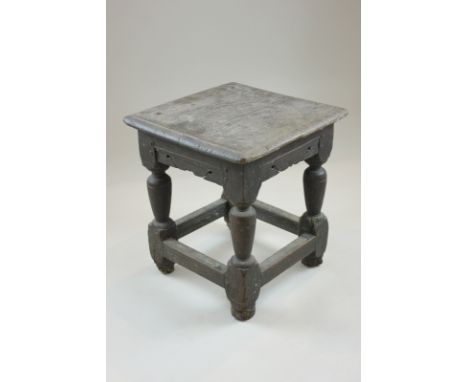 A small 17th century oak stool on turned legs, 32cm (NC)