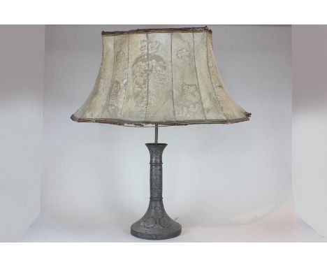 A Chinese bronzed metal table lamp with column support, flared base and all over decoration, 41cm high, (NC)