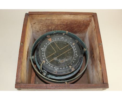 A ship's compass with gimbal action, 22cm, together with a glazed case (NC)